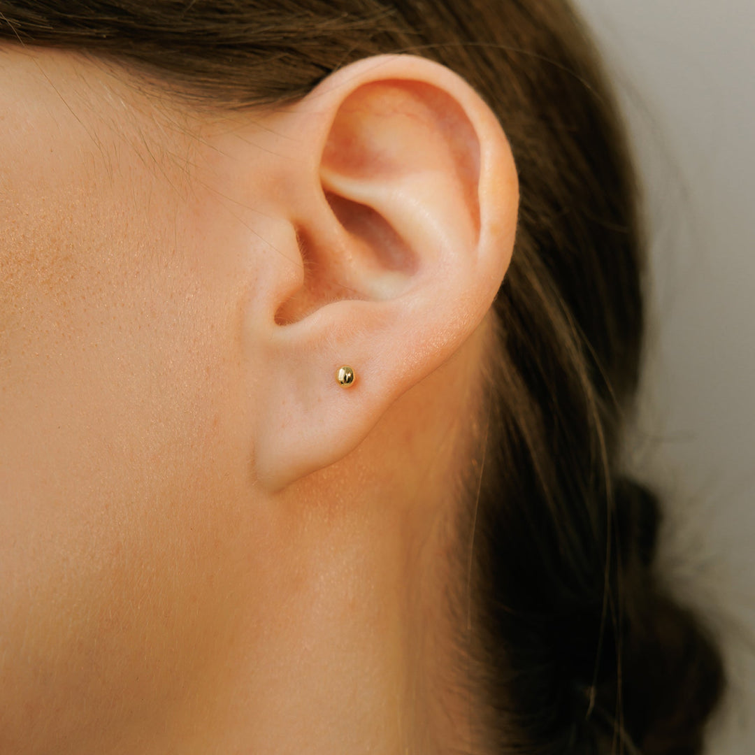 Simple Tiny Gold Ball Piercing